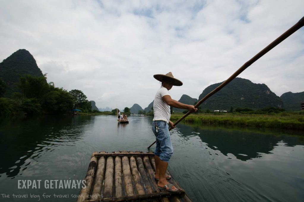 Cruising down the river on a bamboo raft in Yangshou, Guangxi
