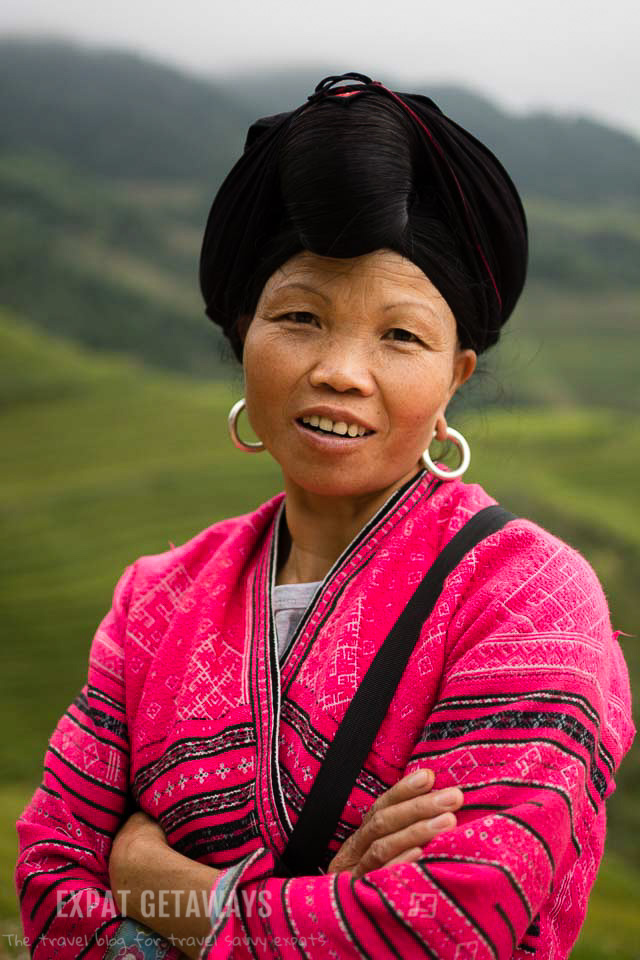 A local Yao woman poses for a photograph. Longji, Guilin